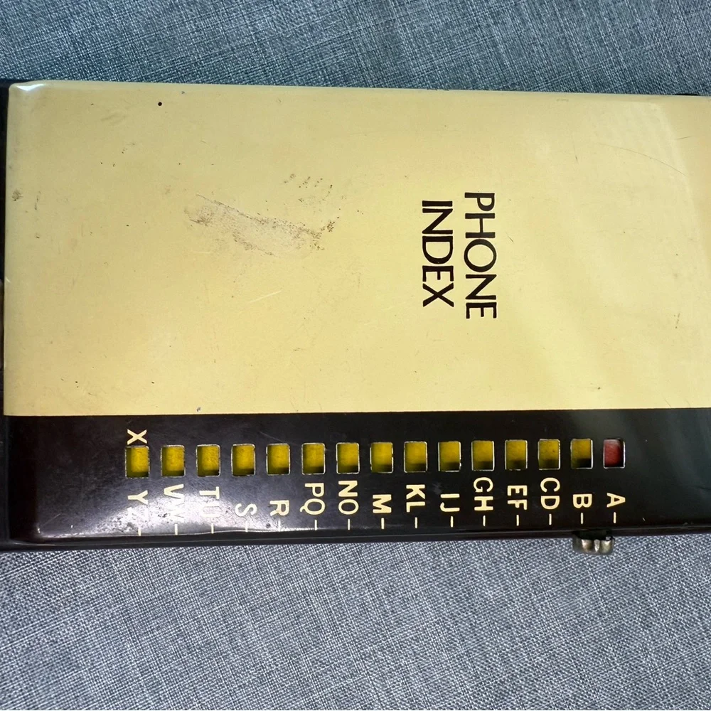 Source Unknown Yellow and Black Phone Index